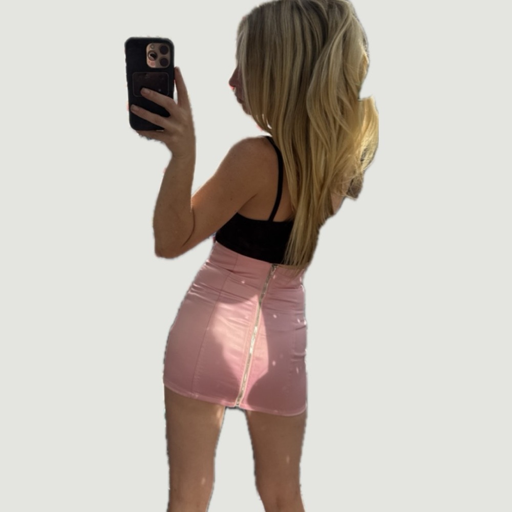 Sugar Thrillz Pink High-Waist Mini Skirt and matching top.